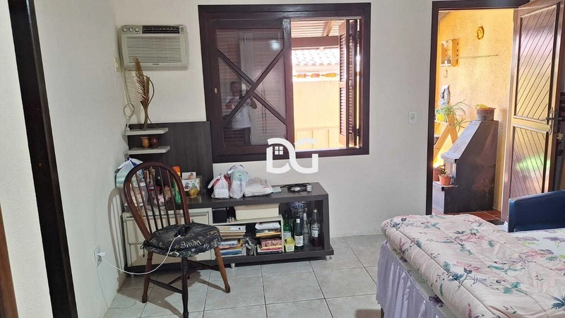 Casa aconchegante e bem distribuída, composta por 3 dormitórios: 16ª foto da galeria de imagens do imóvel