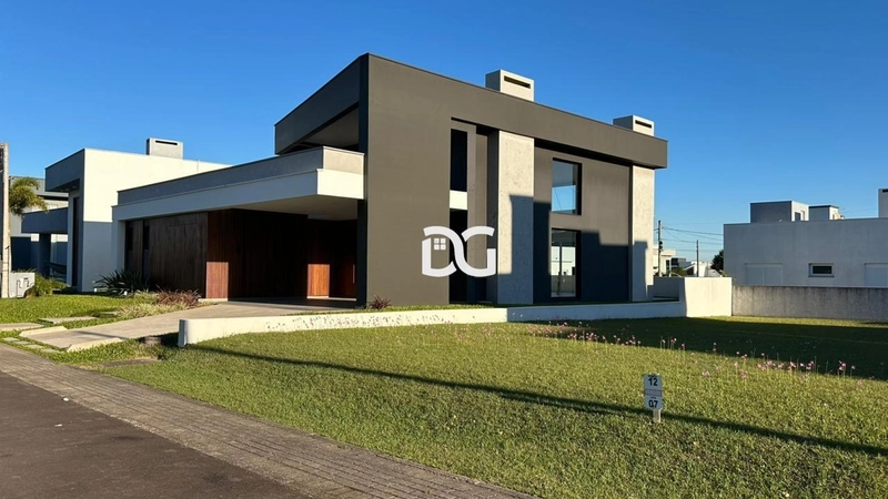 Casa em condomínio com arquitetura moderna e ambientes amplos: 5ª foto da galeria de imagens do imóvel
