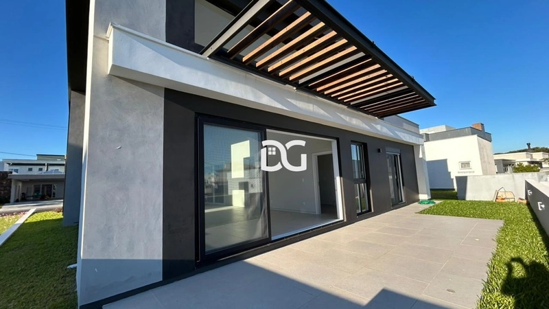 Casa em condomínio com arquitetura moderna e ambientes amplos: 13ª foto da galeria de imagens do imóvel