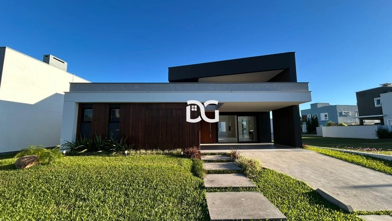 Casa em condomínio com arquitetura moderna e ambientes amplos: 1ª foto da galeria de imagens do imóvel