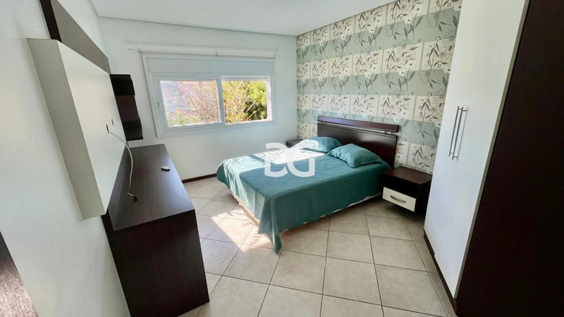 Casa ampla e aconchegante, composta por 4 dormitórios, sendo 2 suítes: 13ª foto da galeria de imagens do imóvel