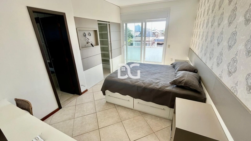 Casa ampla e aconchegante, composta por 4 dormitórios, sendo 2 suítes: 17ª foto da galeria de imagens do imóvel