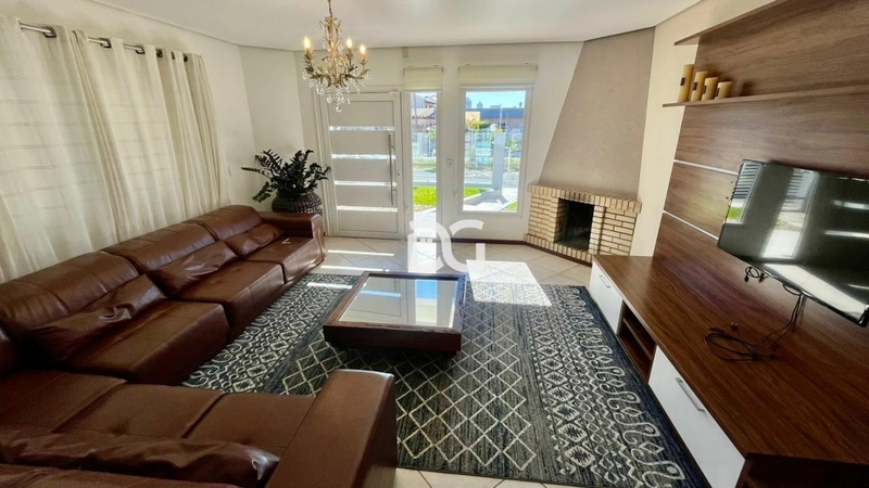 Casa ampla e aconchegante, composta por 4 dormitórios, sendo 2 suítes: 4ª foto da galeria de imagens do imóvel