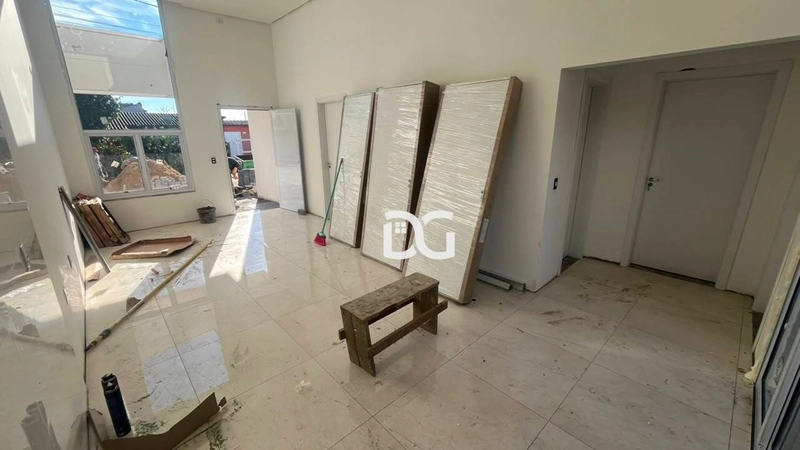 Casa ampla e bem distribuída, composta por 3 dormitórios: 3ª foto da galeria de imagens do imóvel