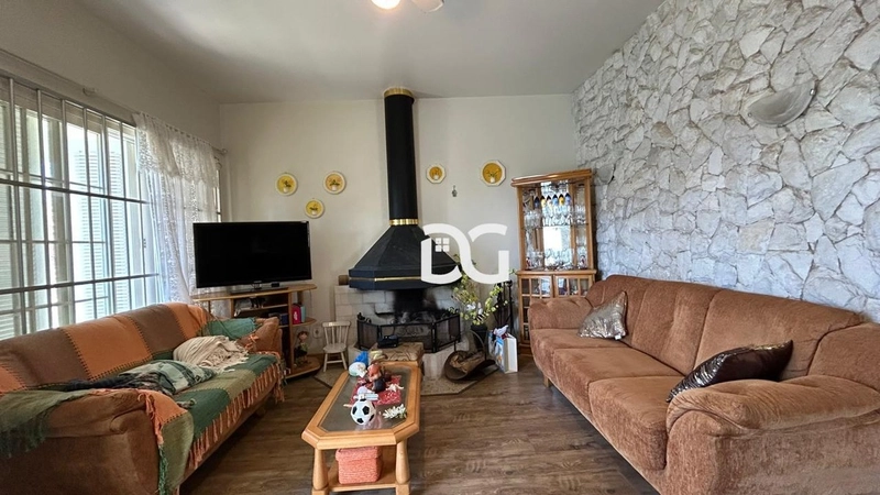 Casa aconchegante e espaçosa, ideal para quem busca conforto e lazer.: 4ª foto da galeria de imagens do imóvel