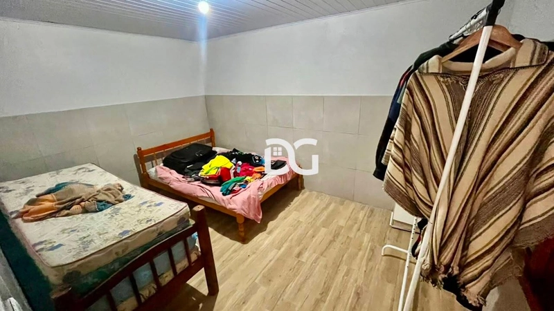 Casa espaçosa e aconchegante, ideal para famílias que buscam conforto: 12ª foto da galeria de imagens do imóvel