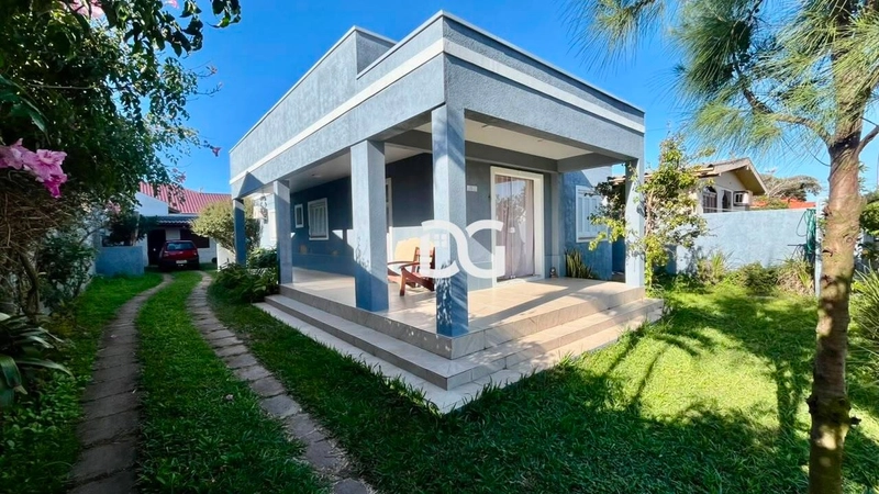 Casa espaçosa e aconchegante, ideal para famílias que buscam conforto: 1ª foto da galeria de imagens do imóvel