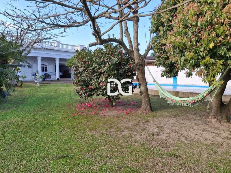 Casa ampla com 4 dormitórios, sendo 2 suítes: 4ª foto da galeria de imagens do imóvel
