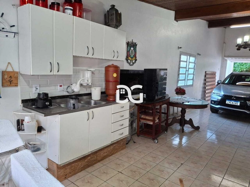 Casa ampla com 4 dormitórios, sendo 2 suítes: 13ª foto da galeria de imagens do imóvel