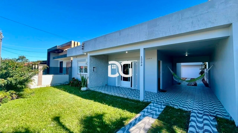 Casa com excelente distribuição, composta por 3 dormitórios: 1ª foto da galeria de imagens do imóvel