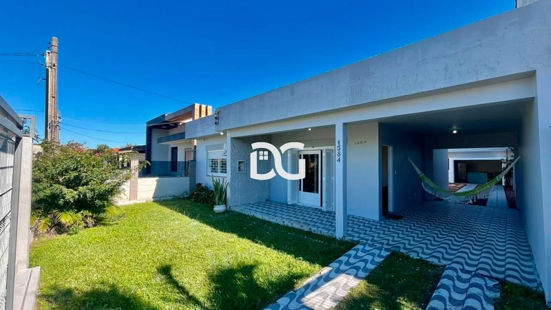 Casa com excelente distribuição, composta por 3 dormitórios: 2ª foto da galeria de imagens do imóvel
