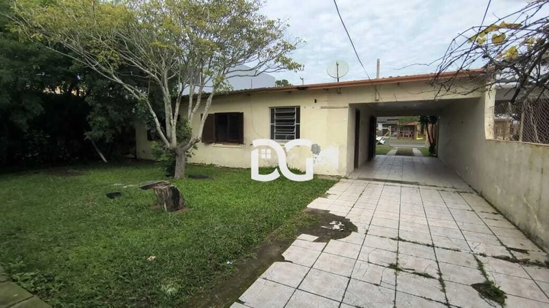 Casa com 3 dormitórios, banheiro social, sala, cozinha e lavanderia.: 2ª foto da galeria de imagens do imóvel