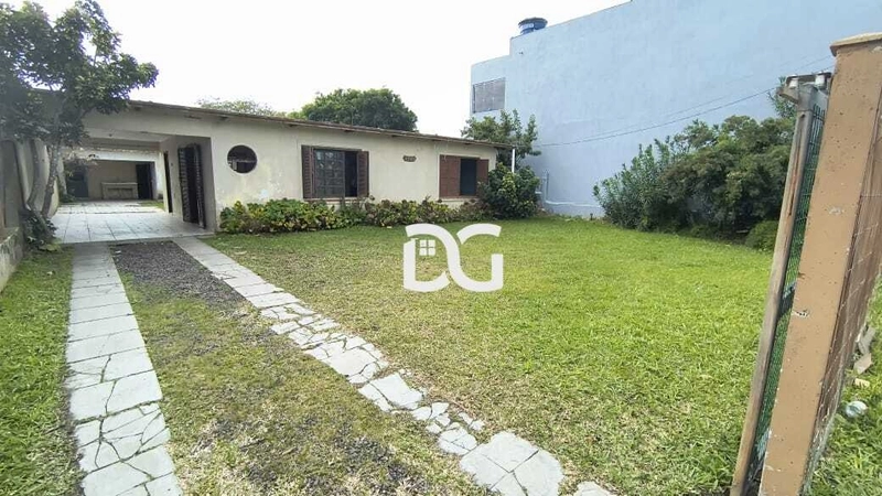 Casa com 3 dormitórios, banheiro social, sala, cozinha e lavanderia.: 4ª foto da galeria de imagens do imóvel