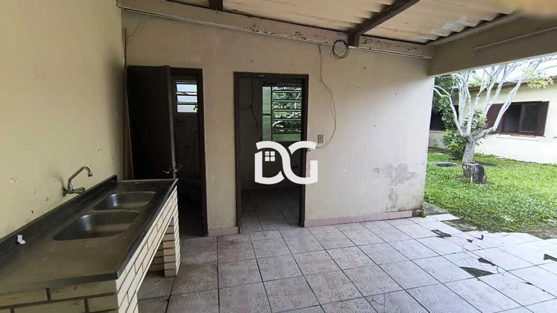 Casa com 3 dormitórios, banheiro social, sala, cozinha e lavanderia.: 14ª foto da galeria de imagens do imóvel