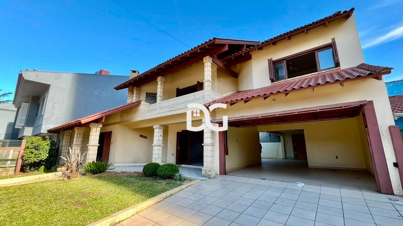 Casa ampla e bem distribuída, composta por 5 dormitórios: 1ª foto da galeria de imagens do imóvel