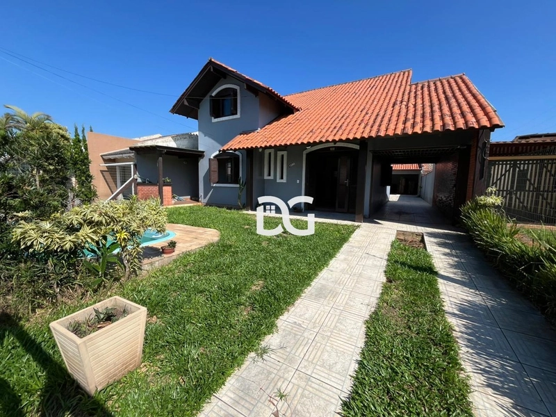 Ampla residência com distribuição dos ambientes com 5 dormitórios: 1ª foto da galeria de imagens do imóvel