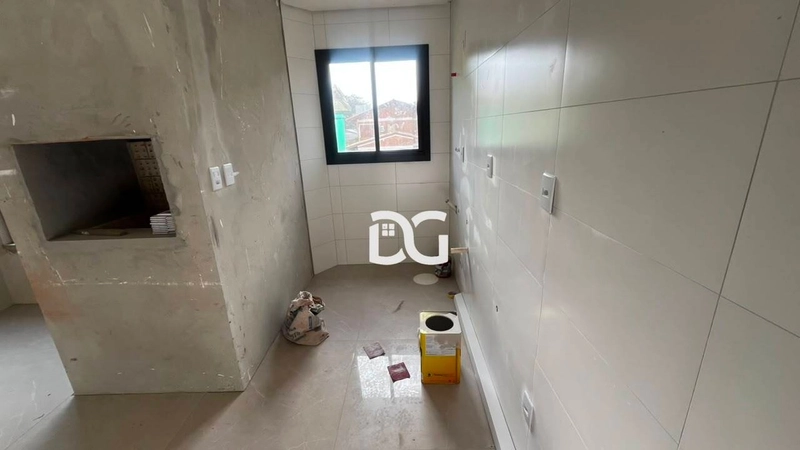 Apartamento confortável e bem distribuído, composto por 2 dormitórios: 4ª foto da galeria de imagens do imóvel
