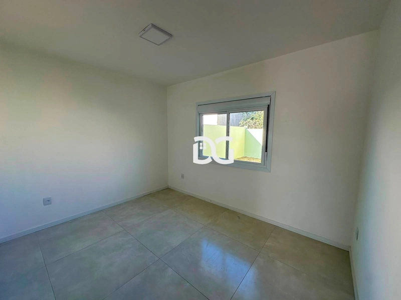Casa ampla e bem distribuída, composta por 2 dormitórios: 9ª foto da galeria de imagens do imóvel