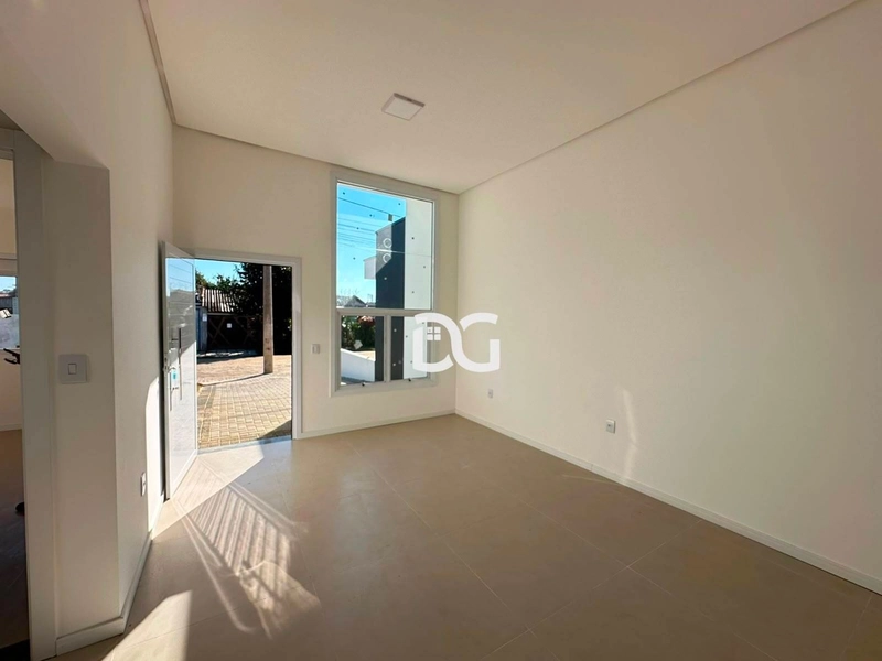 Casa ampla e bem distribuída, composta por 2 dormitórios: 3ª foto da galeria de imagens do imóvel