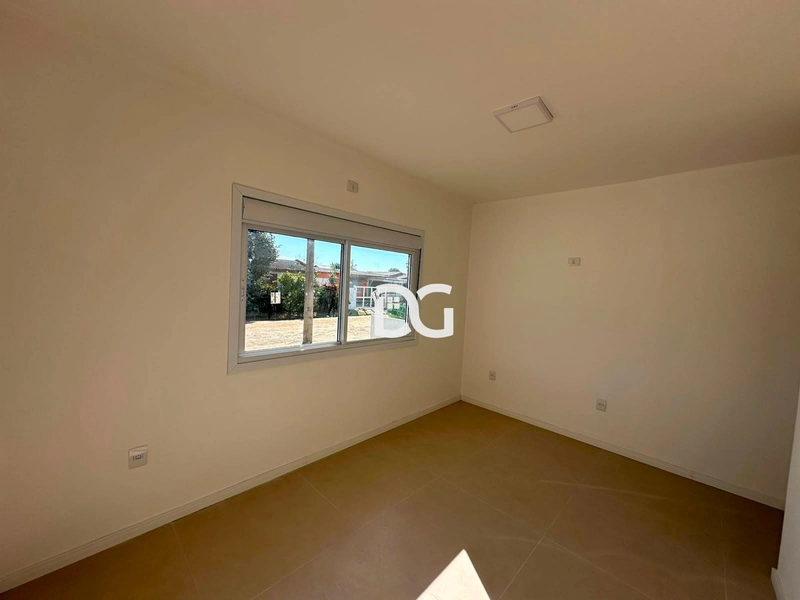 Casa ampla e bem distribuída, composta por 2 dormitórios: 8ª foto da galeria de imagens do imóvel