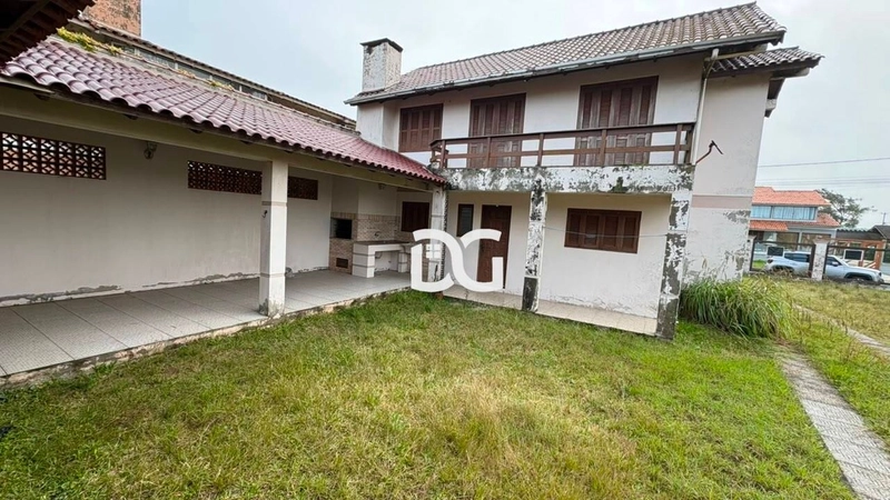 Casa composta de 5 dormitórios, sendo 1 suíte: 3ª foto da galeria de imagens do imóvel