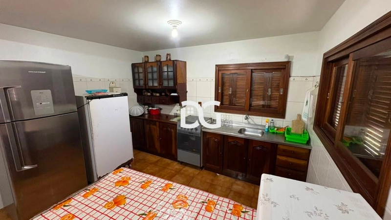 Casa composta de 5 dormitórios, sendo 1 suíte: 11ª foto da galeria de imagens do imóvel