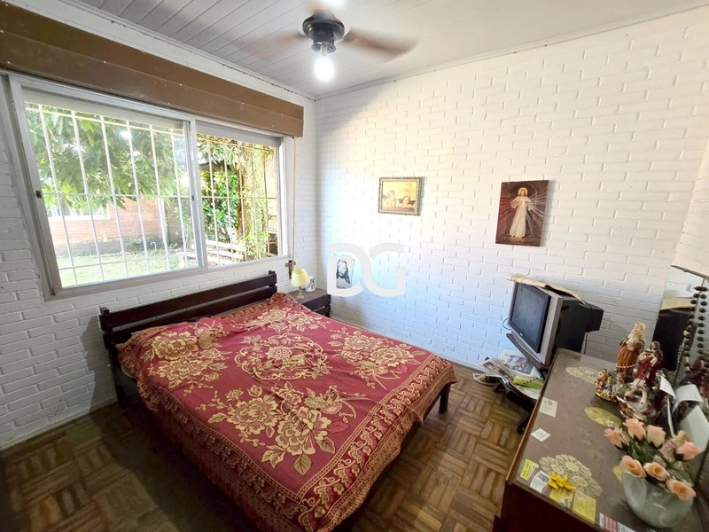 Casa semi-mobiliada com excelente estrutura! Possui 03 dormitórios: 11ª foto da galeria de imagens do imóvel