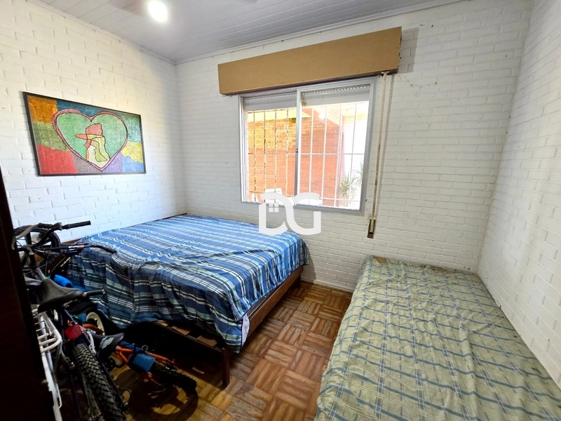 Casa semi-mobiliada com excelente estrutura! Possui 03 dormitórios: 14ª foto da galeria de imagens do imóvel