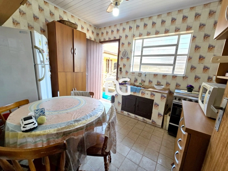 Casa semi-mobiliada com excelente estrutura! Possui 03 dormitórios: 9ª foto da galeria de imagens do imóvel
