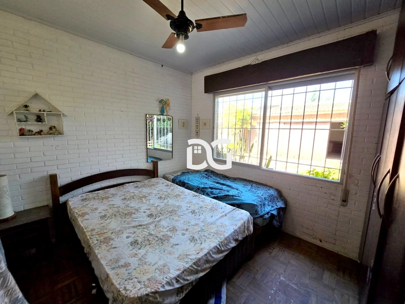 Casa semi-mobiliada com excelente estrutura! Possui 03 dormitórios: 13ª foto da galeria de imagens do imóvel