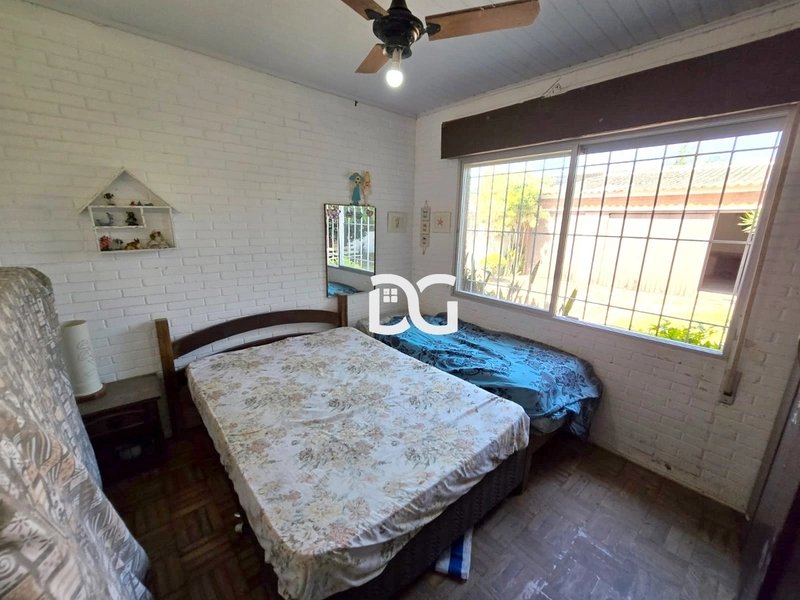 Casa semi-mobiliada com excelente estrutura! Possui 03 dormitórios: 15ª foto da galeria de imagens do imóvel