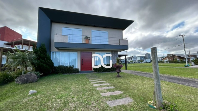 Apresentamos esta belíssima casa térrea com 3 suítes: 1ª foto da galeria de imagens do imóvel
