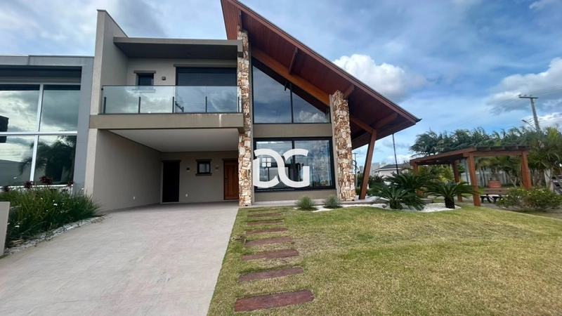 Casa mobiliada, aconchegante e funcional, com 3 suites: 1ª foto da galeria de imagens do imóvel