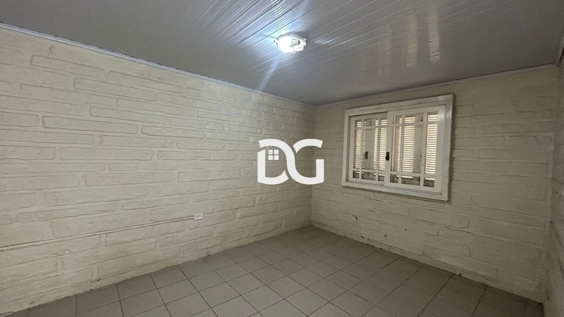 Casa ampla e funcional, composta por 3 dormitórios bem iluminados: 18ª foto da galeria de imagens do imóvel