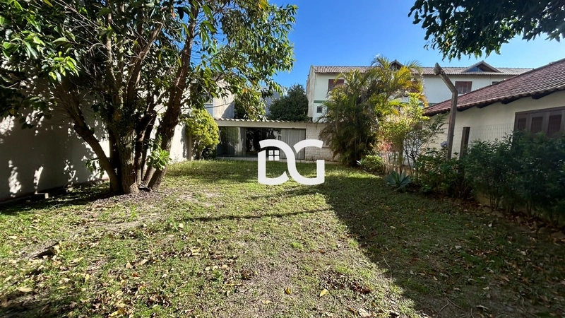 Casa ampla e funcional, composta por 3 dormitórios bem iluminados: 23ª foto da galeria de imagens do imóvel