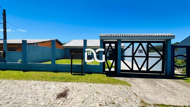 Casa em região central de Imbé: 2ª foto da galeria de imagens do imóvel