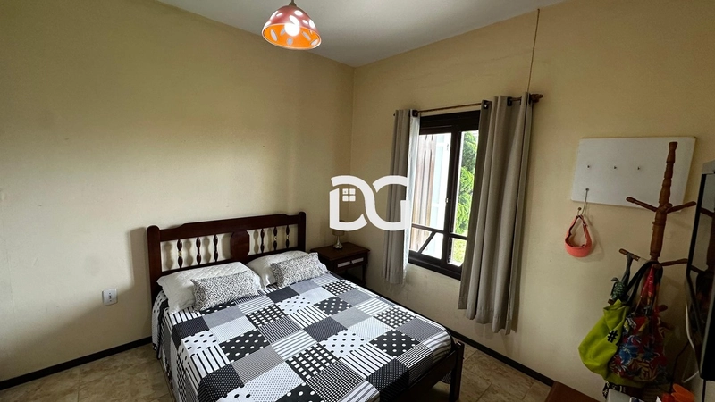 Ampla casa composta por 6 dormitórios, ideal para famílias grandes: 13ª foto da galeria de imagens do imóvel