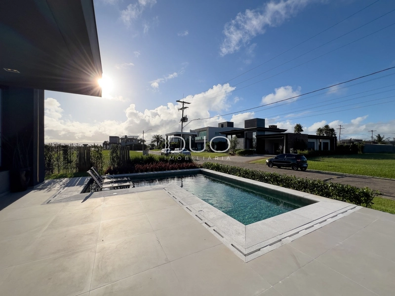 SOBRADO NO CONDOMÍNIO LAGO DO PASSO EM ATLÂNTIDA SUL: 29ª foto da galeria de imagens do imóvel