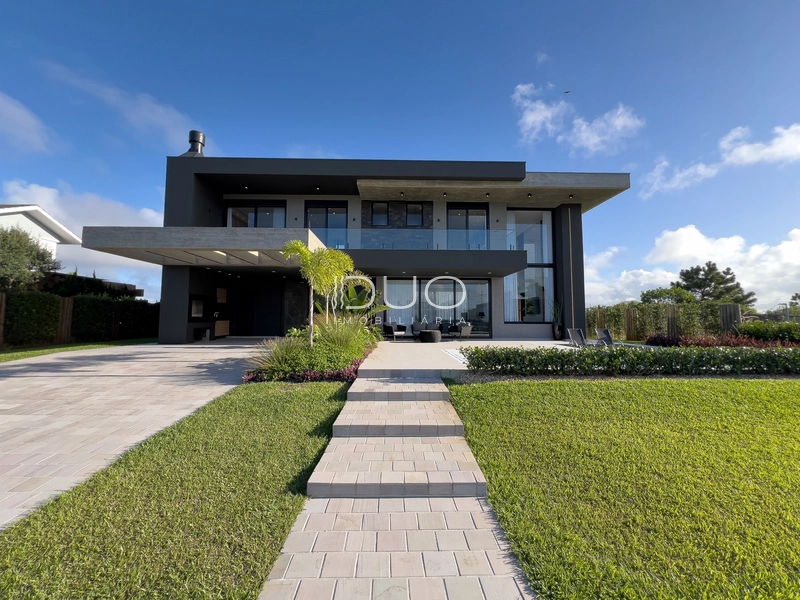 SOBRADO NO CONDOMÍNIO LAGO DO PASSO EM ATLÂNTIDA SUL: 2ª foto da galeria de imagens do imóvel