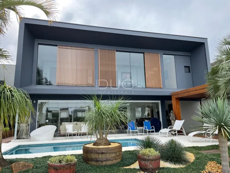 CASA NO CONDOMÍNIO BOSQUES DE ATLÂNTIDA EM XANGRI-LÁ: 1ª foto da galeria de imagens do imóvel