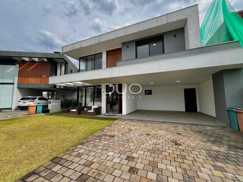 SOBRADO NO CONDOMÍNIO RIVIERA EM XANGRI-LÁ: 3ª foto da galeria de imagens do imóvel