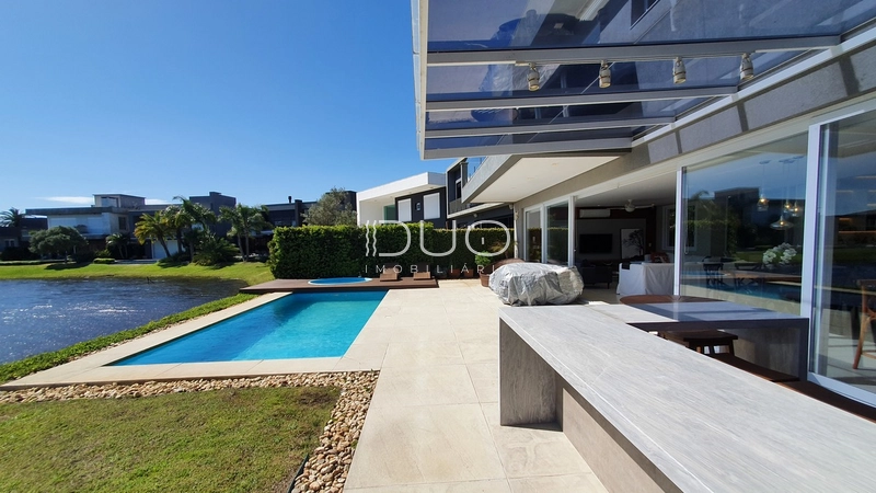 SOBRADO NO CONDOMÍNIO ENSEADA LAGOS EM XANGRI-LÁ: 41ª foto da galeria de imagens do imóvel