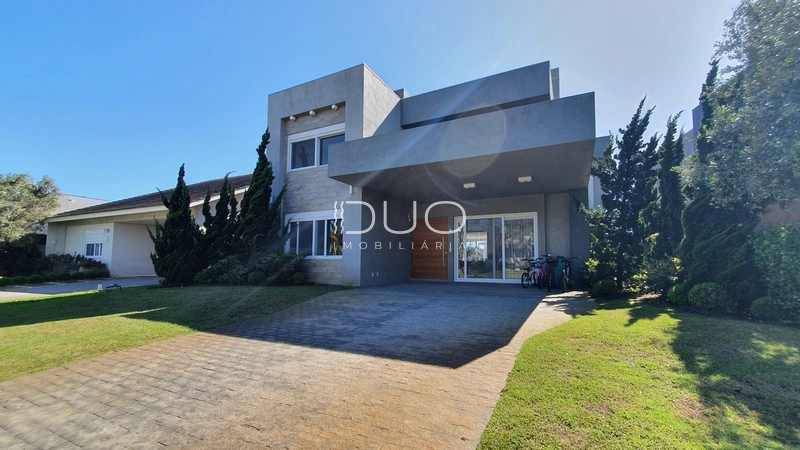 SOBRADO NO CONDOMÍNIO ENSEADA LAGOS EM XANGRI-LÁ: 6ª foto da galeria de imagens do imóvel