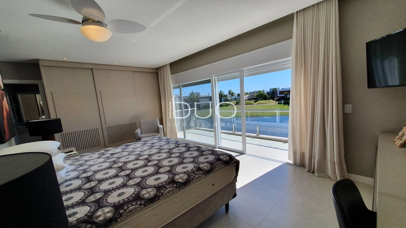 SOBRADO NO CONDOMÍNIO ENSEADA LAGOS EM XANGRI-LÁ: 71ª foto da galeria de imagens do imóvel