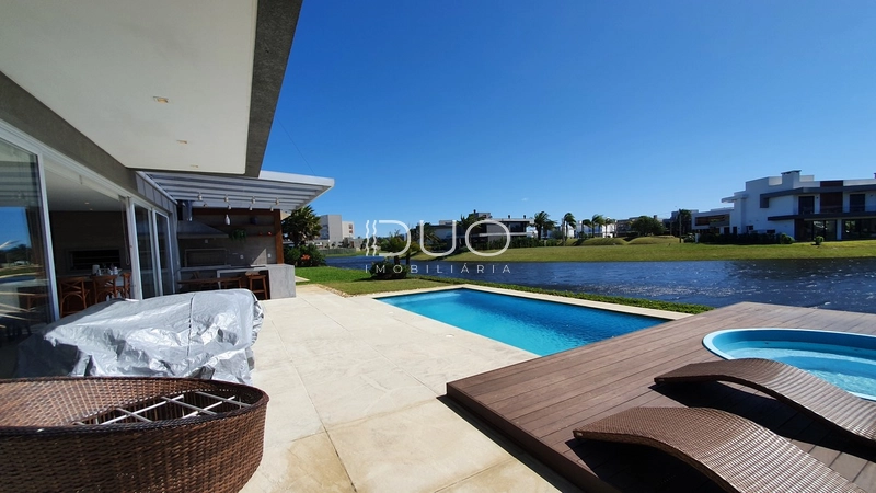 SOBRADO NO CONDOMÍNIO ENSEADA LAGOS EM XANGRI-LÁ: 44ª foto da galeria de imagens do imóvel