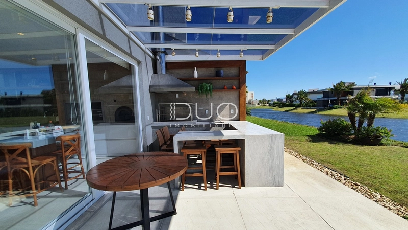 SOBRADO NO CONDOMÍNIO ENSEADA LAGOS EM XANGRI-LÁ: 36ª foto da galeria de imagens do imóvel