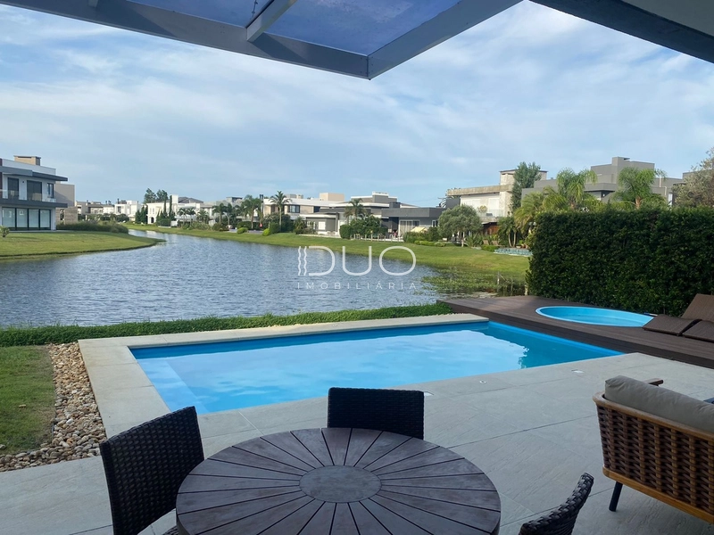 SOBRADO NO CONDOMÍNIO ENSEADA LAGOS EM XANGRI-LÁ: 39ª foto da galeria de imagens do imóvel