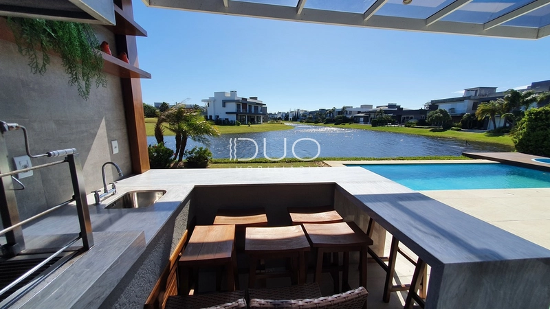 SOBRADO NO CONDOMÍNIO ENSEADA LAGOS EM XANGRI-LÁ: 38ª foto da galeria de imagens do imóvel