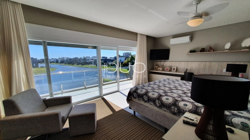 SOBRADO NO CONDOMÍNIO ENSEADA LAGOS EM XANGRI-LÁ: 76ª foto da galeria de imagens do imóvel