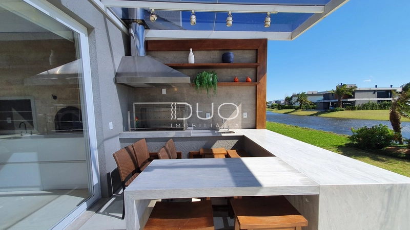 SOBRADO NO CONDOMÍNIO ENSEADA LAGOS EM XANGRI-LÁ: 34ª foto da galeria de imagens do imóvel